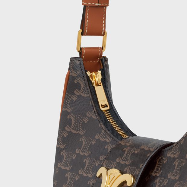 Celine Medium Ava Triomphe Bag in Triomphe Canvas Tan - side view