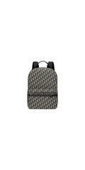 Front view — Dior Men's Safari Backpack in beige and navy blue Dior Oblique jacquard with front zip pocket, padded shoulder straps and 'DIOR' hardware detail
