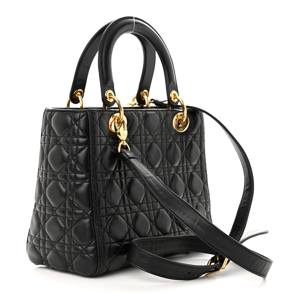 Back/side view — Dior Lady Dior Medium Bag in black lambskin cannage with gold-tone DIOR letter charms and detachable shoulder strap
