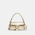 Coach Pillow Tabby 18 metallic champagne front view