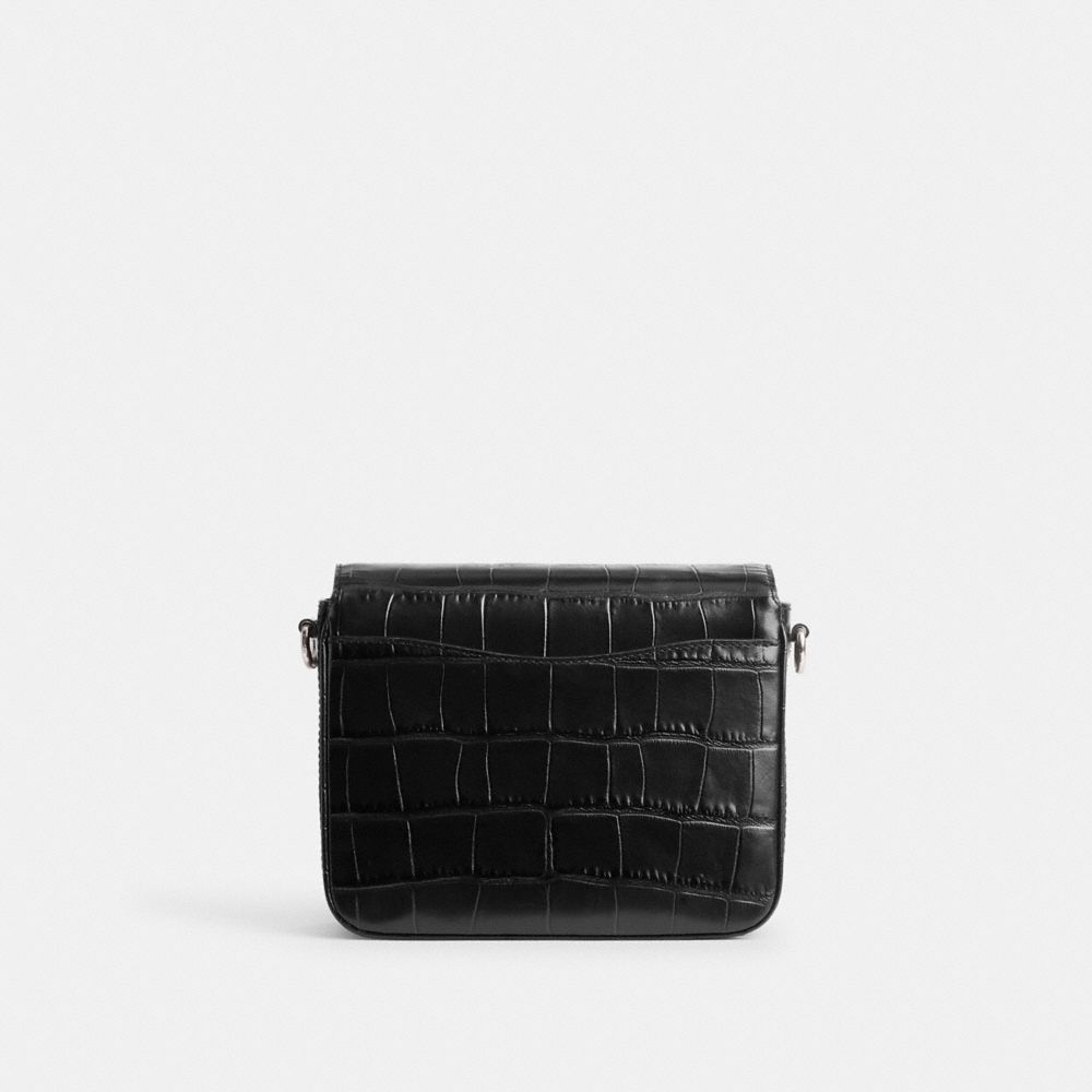 Coach Cassie Crossbody 19 black croc-embossed detail view