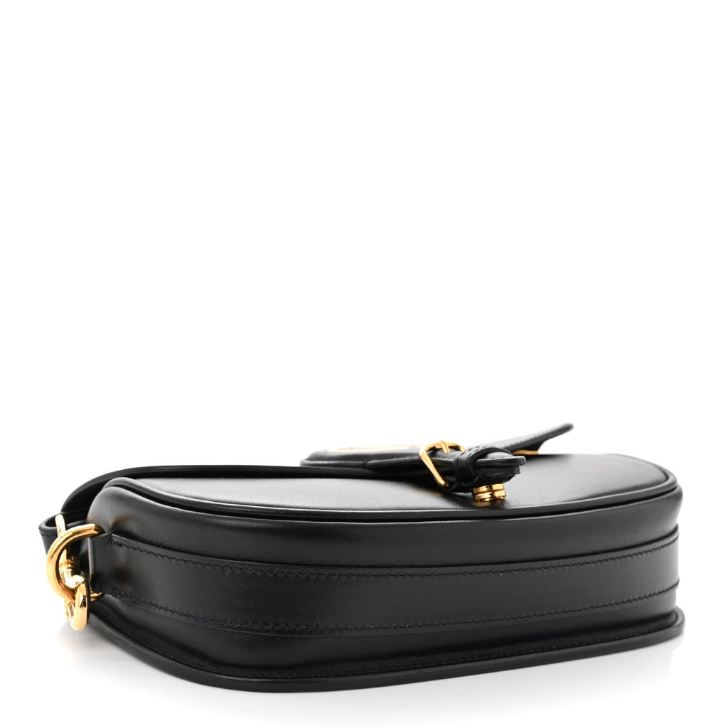 Profile/base view — Dior Bobby East-West Bag in black box calfskin showing structured silhouette and gold-tone D-ring hardware