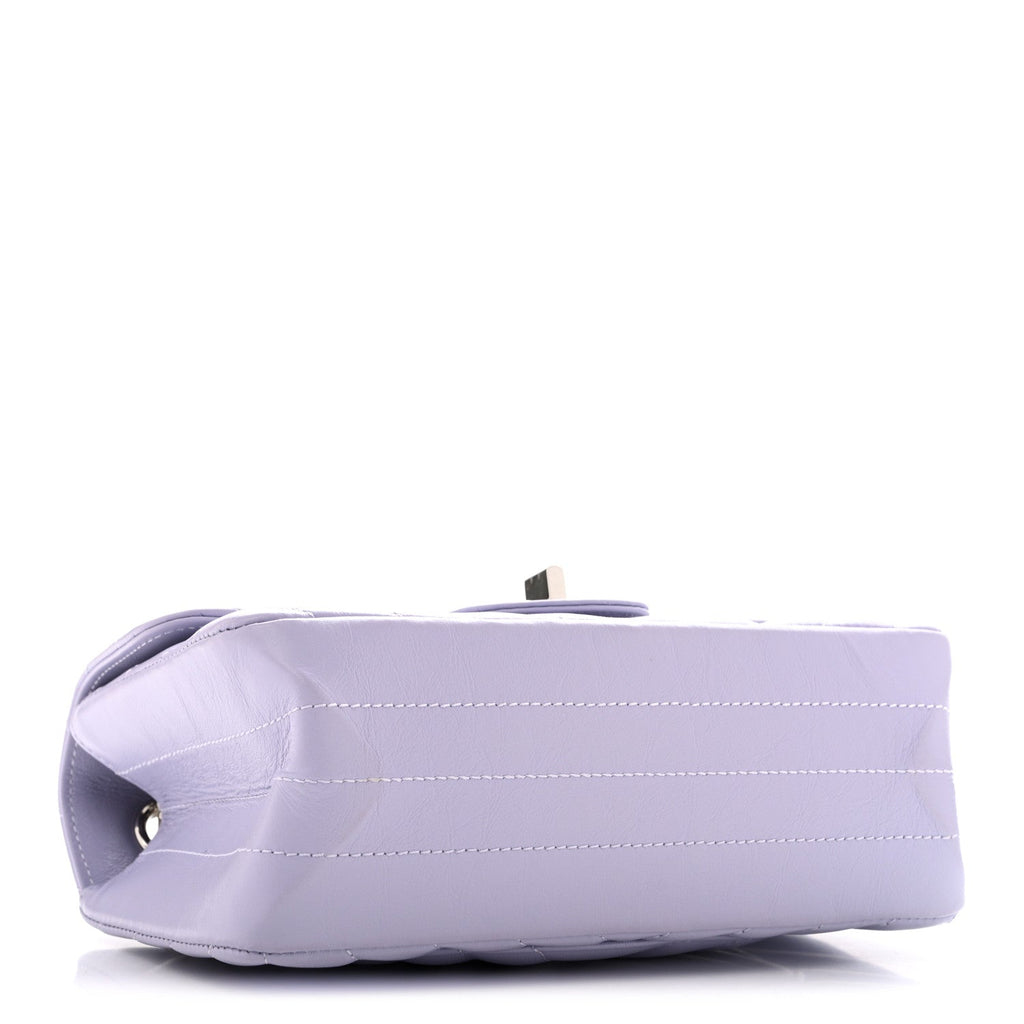 Chanel Aged Calfskin Chevron Quilted 2.55 Reissue Mini Flap Light Purple