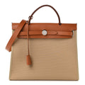 Hermès Vache Hunter Toile Officier Herbag Zip PM 31 Trench Fauve